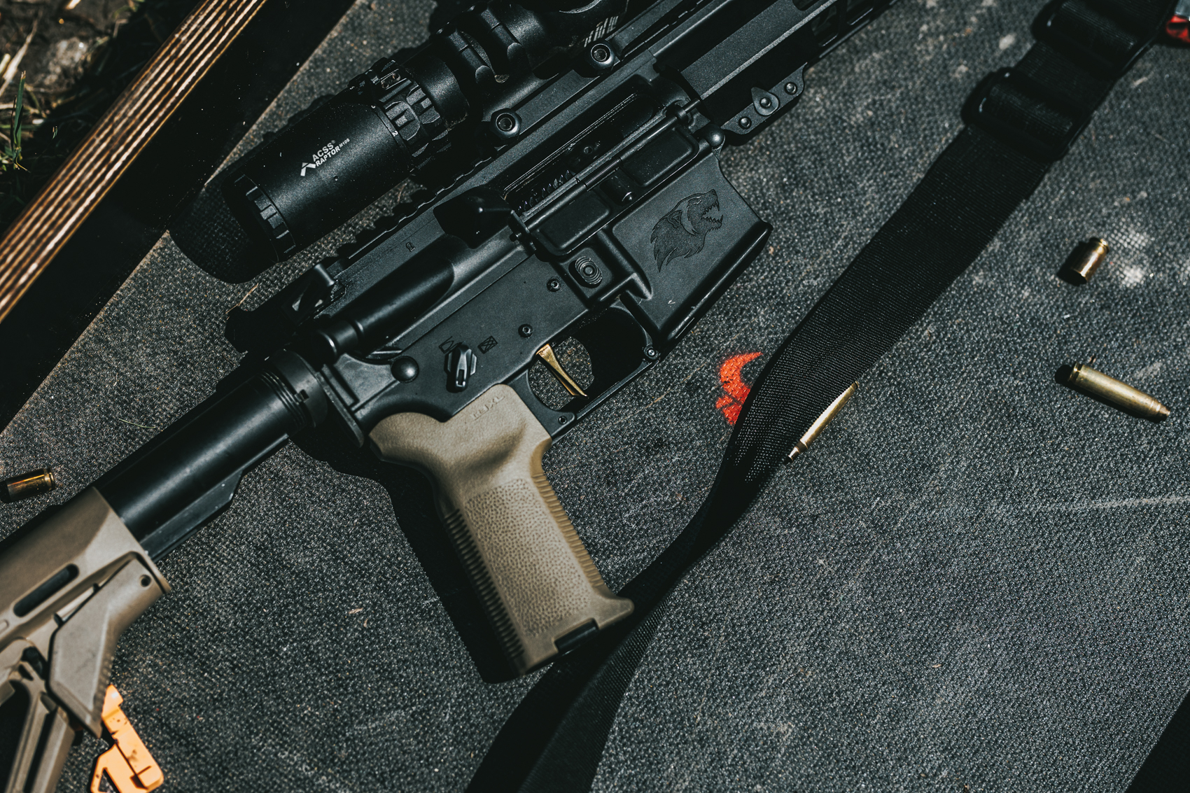 TTG Europe rental AR15 fitted with Mimtac trigger, ready on the mat