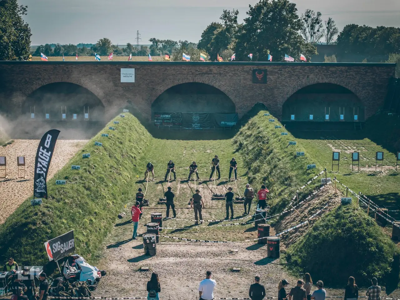 Competitors and spectators celebrating at a Tactical Games event