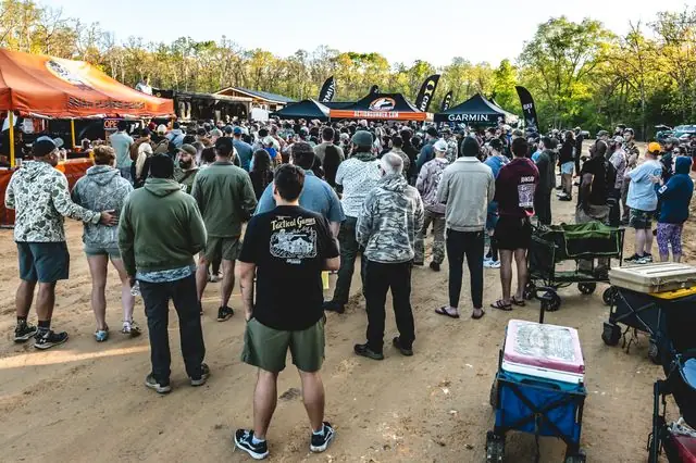 Spectators cheering on competitors at a Tactical Games event